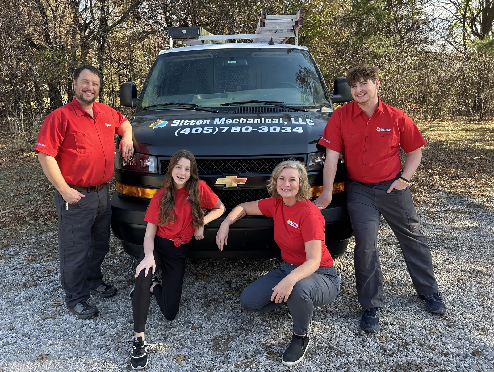 The Sitton family with their service vehicle